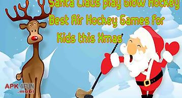 Santa claus play glow hockey - b..